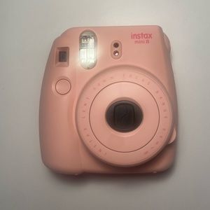 pink polaroid camera